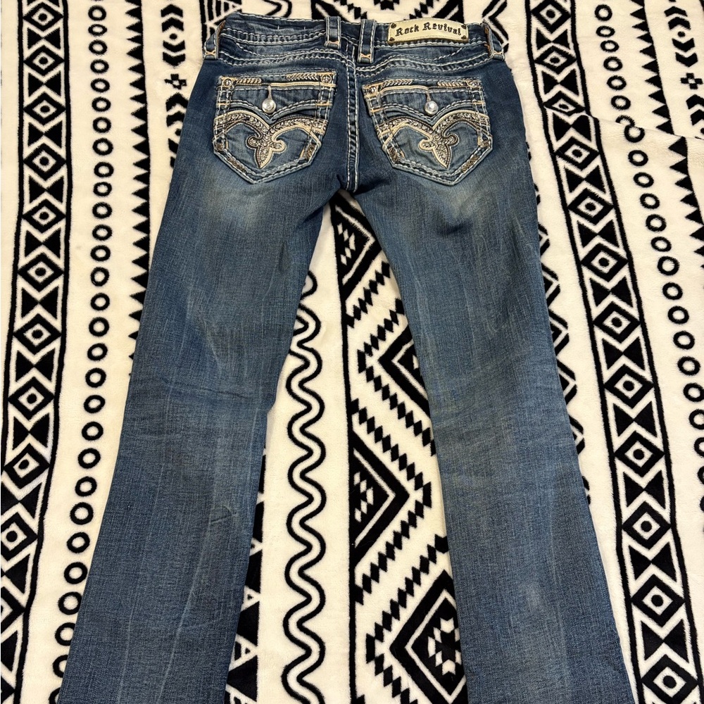 Rock Revival Blue Boot Cut Jeans with Distressed Details